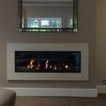 Large Bell Fire Horizon with Limestone Frame and False Chimney Breast